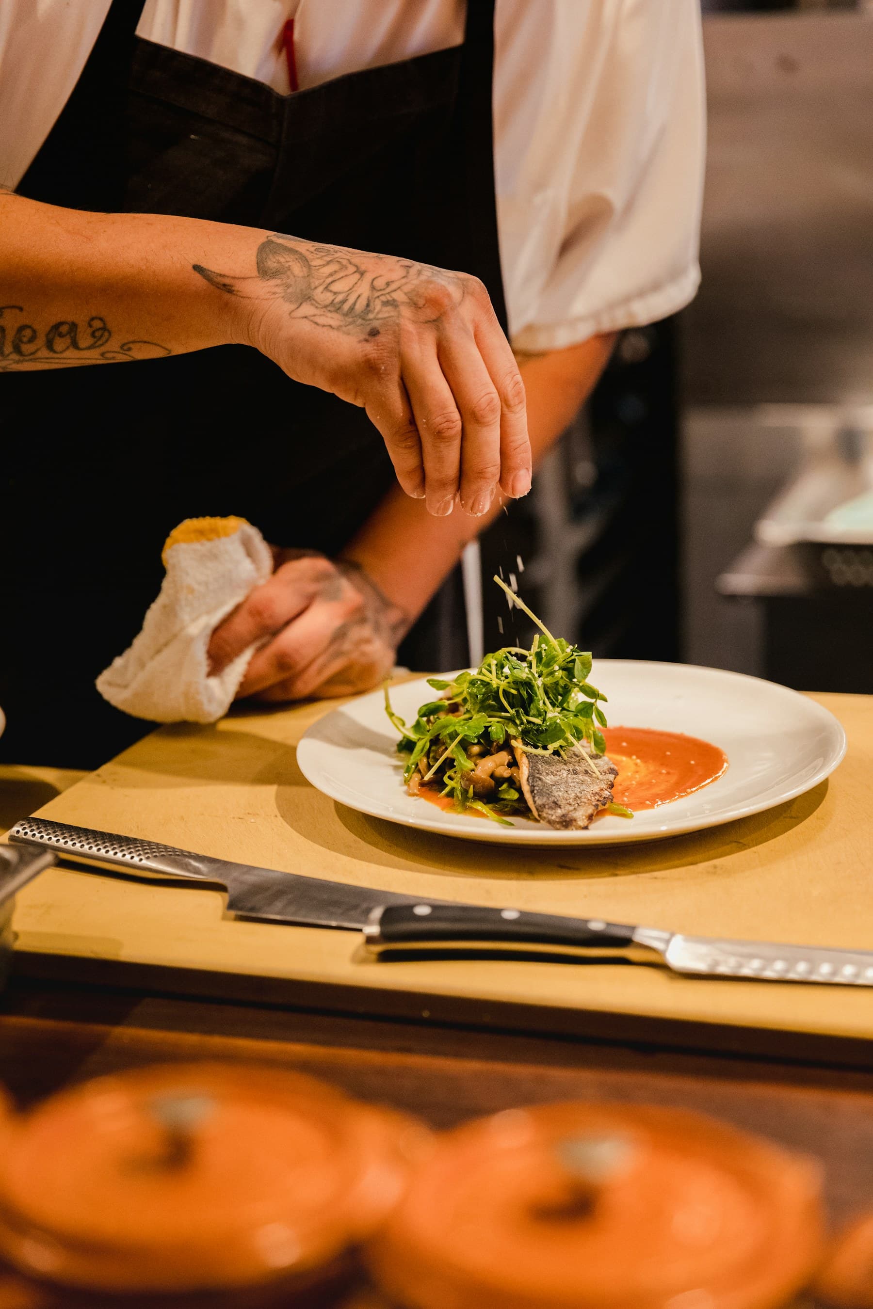 Chef plating food during restaurant service